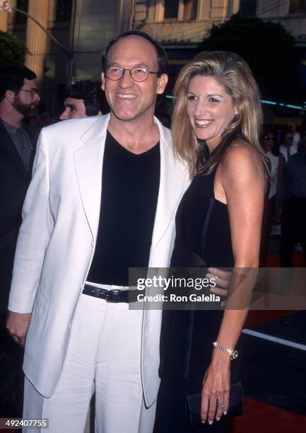 Director Charles Russell and date attend the "Eraser" Hollywood Premiere on June 11, 1996 at the Mann's Chinese Theatre in Hollywood, California.