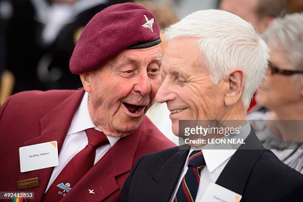 World War II veterans Geoffrey Pattison and Ronald Knight speak aboard HMS Belfast in central London, on May 20 during an event to mark the 70th...