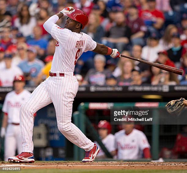Left fielder Domonic Brown of the Philadelphia Phillies swings the bat against the Toronto Blue Jays on May 6, 2014 at Citizens Bank Park in...