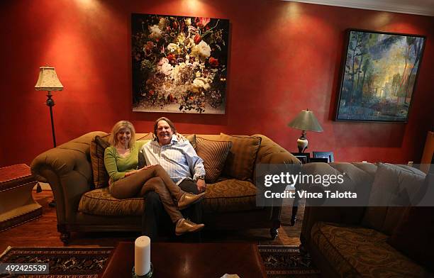 Film producer Don Carmody and wife Catherine Gourdier in their Forest Hill home in Toronto on May 15, 2014