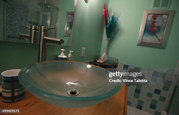 Film producer Don Carmody and wife Catherine Gourdier bathroom in their Forest Hill home in Toronto on May 15, 2014