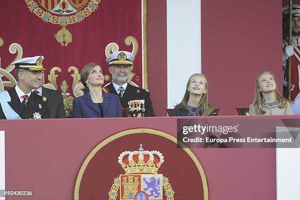 King Felipe of Spain, Queen Letizia of Spain, Princess Sofia and Princess Leonor attend the National Day Military Parade 2015 on October 12, 2015 in...