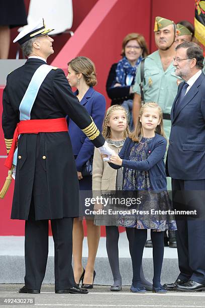 Mariano Rajoy , King Felipe of Spain, Queen Letizia of Spain, Princess Sofia and Princess Leonor attend the National Day Military Parade 2015 on...