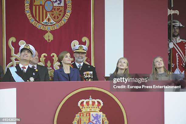 King Felipe of Spain, Queen Letizia of Spain, Princess Sofia and Princess Leonor attend the National Day Military Parade 2015 on October 12, 2015 in...