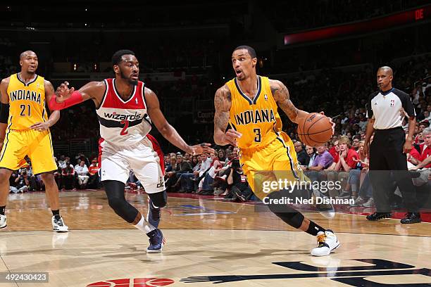 George Hill of the Indiana Pacers drives to the basket against the Washington Wizards in Game Six of the Eastern Conference Semifinals during the...