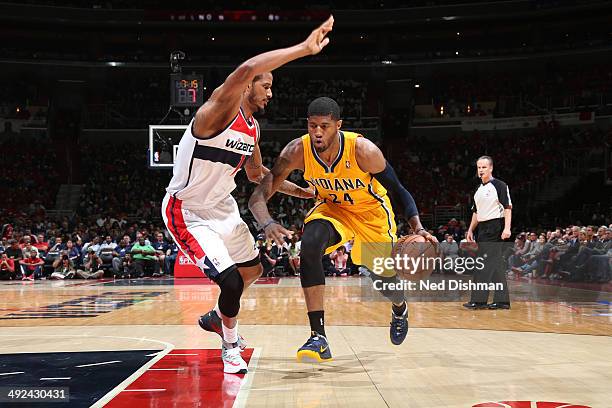 Paul George of the Indiana Pacers drives to the basket against the Washington Wizards in Game Six of the Eastern Conference Semifinals during the...