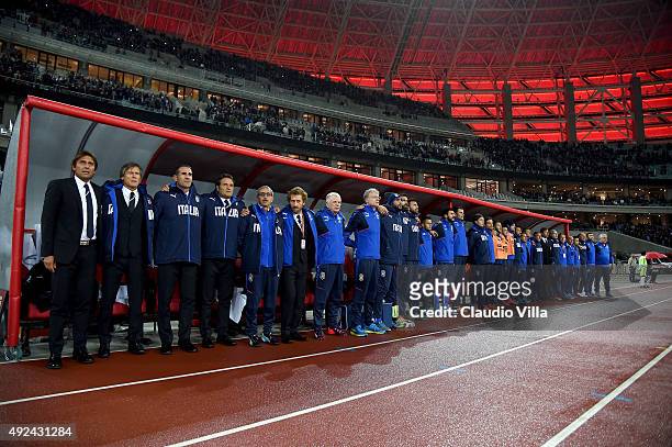 Antonio Conte of Italy bench stand for the national anthem before the UEFA Euro 2016 qualifying football match between Azerbaijan and Italy at...