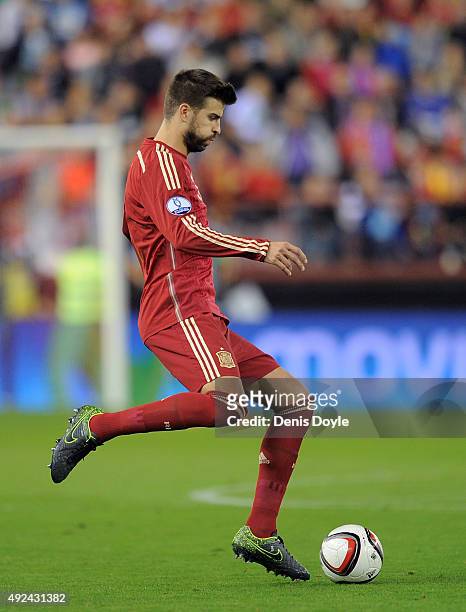 Gerard Pique of Spain in action during the UEFA EURO 2016 Qualifier group C match between Spain and Luxembourg at Estadio Municipal Las Gaunas on...