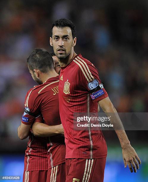 Sergio Busquets celebrates after Santi Cazorla of Spain scored Spain's opening goal during the UEFA EURO 2016 Qualifier group C match between Spain...