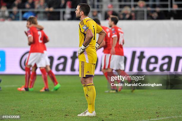 Goalkeeper Aldo Simoncini of San Marino looks dejected after conceding the first goal during the UEFA EURO 2016 qualifier between Switzerland and San...