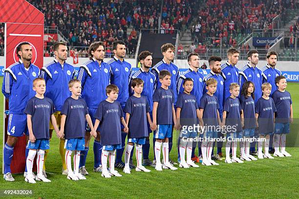 San Marino stand during the anthem prior to the UEFA EURO 2016 qualifier between Switzerland and San Marino at AFG Arena on October 9, 2015 in St...