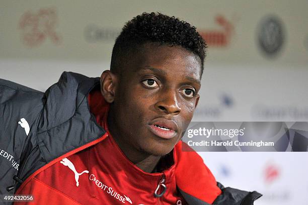 Francois Moubandje of Switzerland looks on from the bench prior to the UEFA EURO 2016 qualifier between Switzerland and San Marino at AFG Arena on...