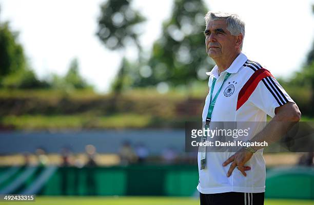 Coach Frank Engel of Germany looks on prior to the international friendly U15 match between Germany and Netherlands on May 20, 2014 in Weingarten,...