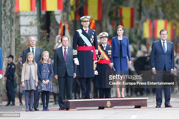 Mariano Rajoy , King Felipe of Spain , Queen Letizia of Spain, Princess Leonor and Princess Sofia attend the National Day Military Parade 2015 on...