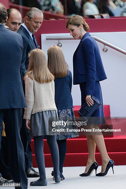 Queen Letizia of Spain, Princess Leonor and Princess Sofia attend the National Day Military Parade 2015 on October 12, 2015 in Madrid, Spain.