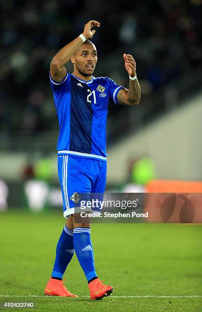 Josh Magennis of Northern Ireland celebrates after the UEFA EURO 2016 Qualifying match between Finland and Northern Ireland at the Olympic Stadium on...