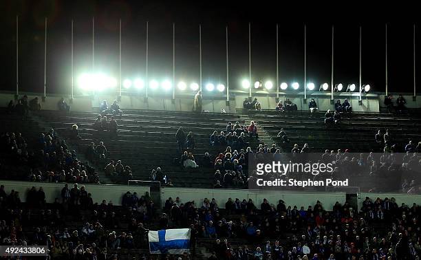 Finland fans are illuminated by floodlights during the UEFA EURO 2016 Qualifying match between Finland and Northern Ireland at the Olympic Stadium on...