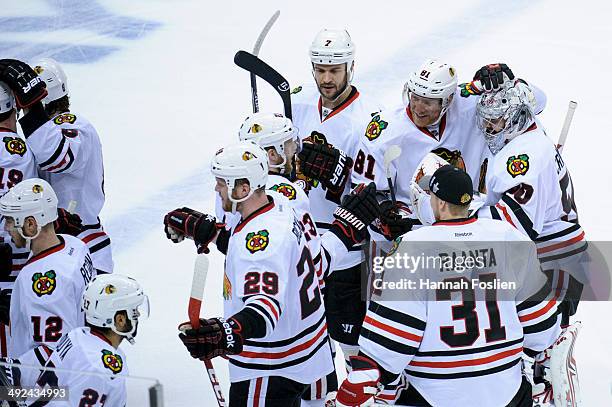 The Chicago Blackhawks celebrate a win of Game Six of the Second Round of the 2014 NHL Stanley Cup Playoffs against the Minnesota Wild on May 13,...