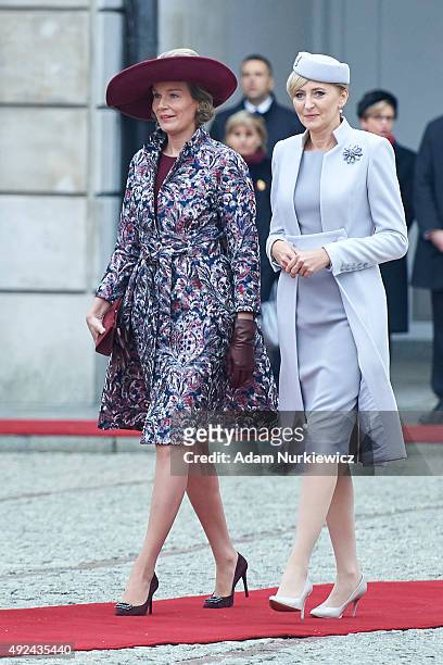Queen Mathilde of Belgium and Polish First Lady Agata Kornhauser-Duda attend the welcoming ceremony at the Presidential Palace as part of official...