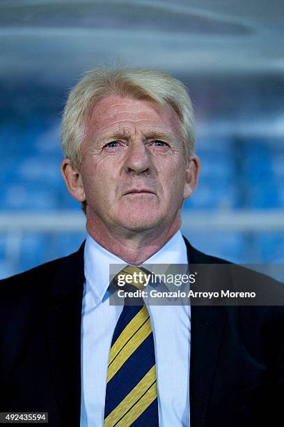 Head coach Gordon Strachan of Scotland listens to his National anthem at the bench prior to start the UEFA EURO 2016 Qualifying round Group G match...