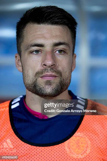 Russell Martin of Scotland listens to his National anthem at the bench prior to start the UEFA EURO 2016 Qualifying round Group G match between...