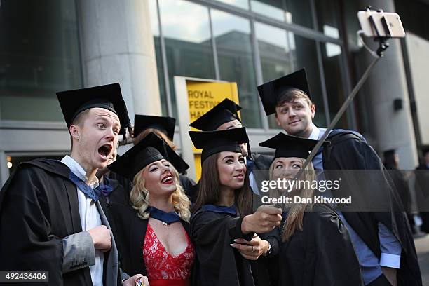 Students take a selfie ahead of their graduation ceremony at the Royal Festival Hall on October 13, 2015 in London, England. Students of the London...