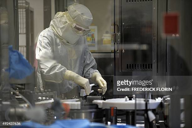 An employee works in an unit dedicated to the production of insulin pens at the factory of the US pharmaceutical company Eli Lilly in Fegersheim,...
