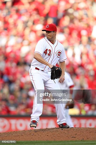 Manny Parra of the Cincinnati Reds pitches during the game against the St. Louis Cardinals at Great American Ball Park on Monday, March 31, 2014 in...