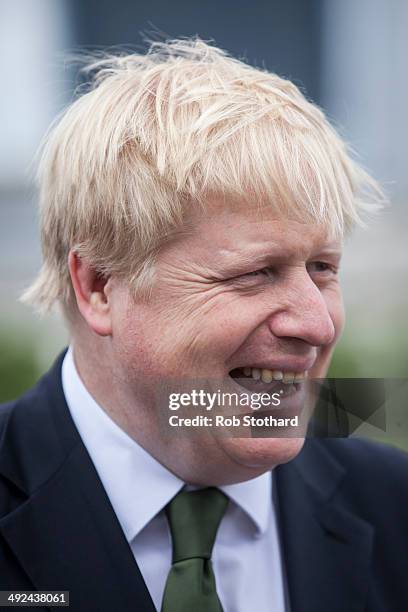 The Mayor of London, Boris Johnson, greets veterans aboard the HMS Belfast for the 70th anniversary D-Day commemorations on May 20, 2014 in London,...