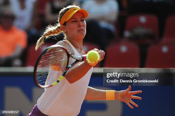 Eugenie Bouchard of Canada plays a forehand during her match against Anastasia Rodionova of Australia during Day 4 of the Nuernberger...