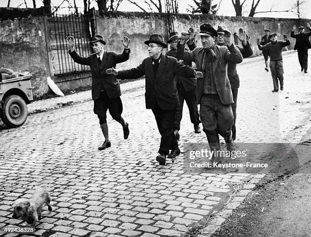 German civilians surrendering at the arrival of the US military on March 6, 1945 in Trier, Germany.