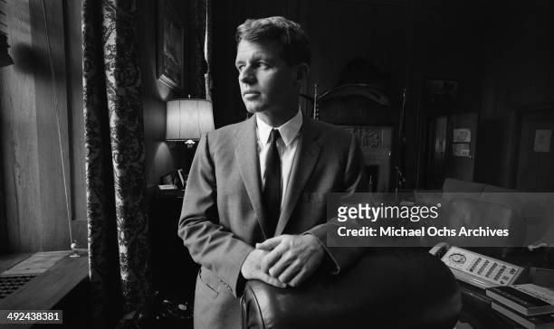 United States Attorney General Robert Kennedy poses for a portrait in his Justice Department office circa 1964 in Washington, DC.