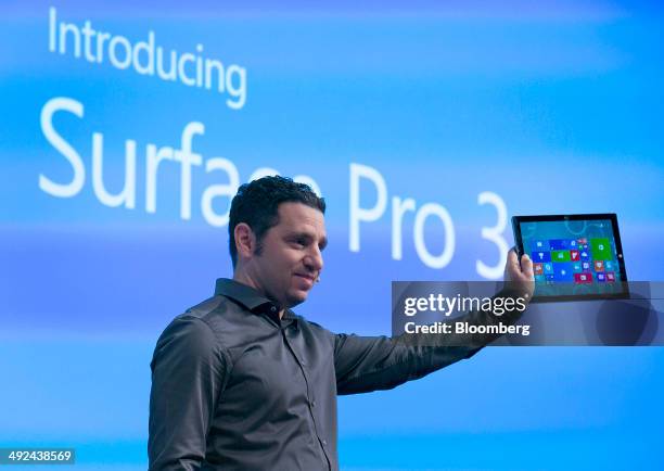 Panos Panay, corporate vice president of Microsoft Corp. Surface, displays the Surface Pro 3 during an event in New York, U.S., on Tuesday, May 20,...