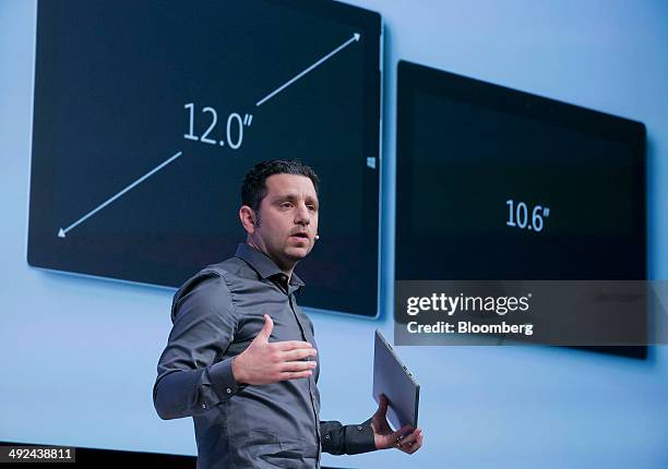 Panos Panay, corporate vice president of Microsoft Corp. Surface, holds the Surface Pro 3 while speaking at an event in New York, U.S., on Tuesday,...