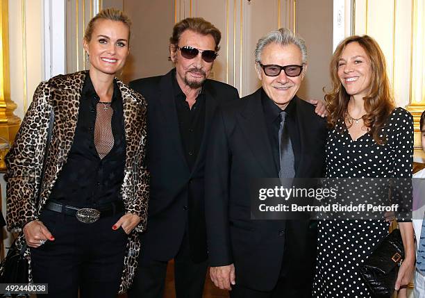 Singer Johnny Hallyday with his wife Laeticia and Actor Harvey Keitel with his wife Daphna Kastner attend Harvey Keitel receives the Medal of...