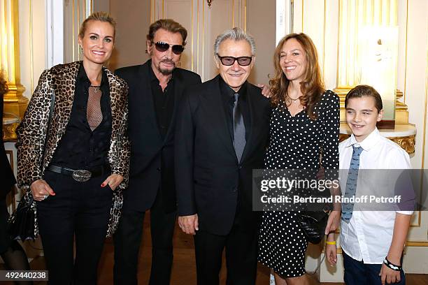 Singer Johnny Hallyday with his wife Laeticia and Actor Harvey Keitel with his wife Daphna Kastner and their son Roman Keitel attend Harvey Keitel...
