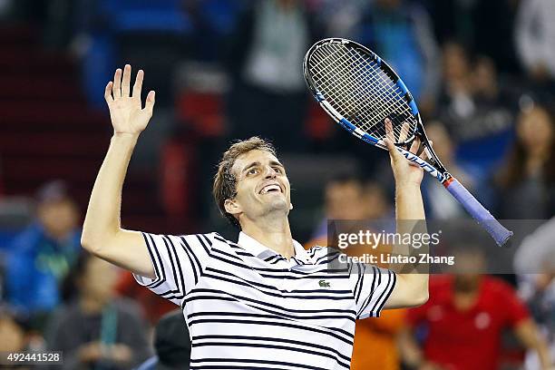 Albert Ramos-Vinolas of Spain celebrates after winning his match against Roger Federer of Switzerland during their men's singles second round match...