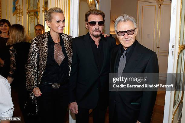 Singer Johnny Hallyday with his wife Laeticia and Actor Harvey Keitel attend Harvey Keitel receives the Medal of Commander of Arts and Letter at...