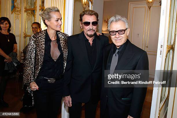 Singer Johnny Hallyday with his wife Laeticia and Actor Harvey Keitel attend Harvey Keitel receives the Medal of Commander of Arts and Letter at...
