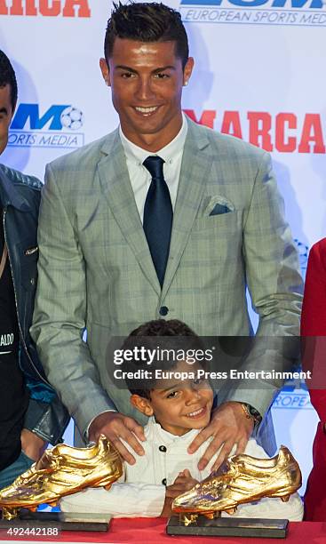 Real Madrid football player Cristiano Ronaldo and his son Cristiano Ronaldo jr attend the award ceremony to present Cristiano Ronaldo with his fourth...