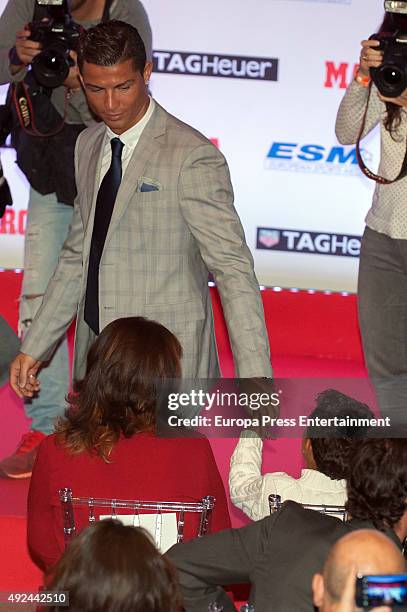 Real Madrid football player Cristiano Ronaldo, his son Cristiano Ronaldo jr and his mother Maria Dolores Dos Santos Aveiro attend the award ceremony...