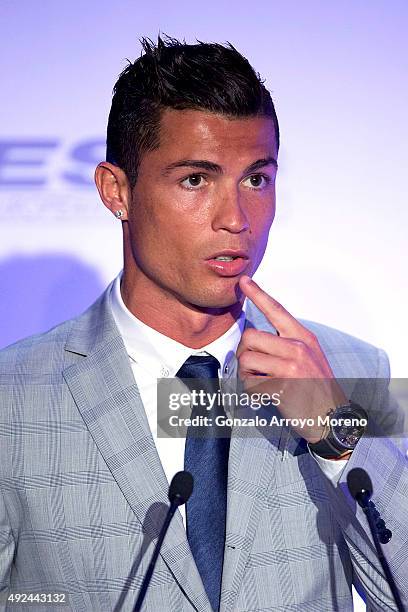 Real Madrid football player Cristiano Ronaldo gestures during his speech after receiving his fourth Golden Boot Award as maximun goal scorer of...