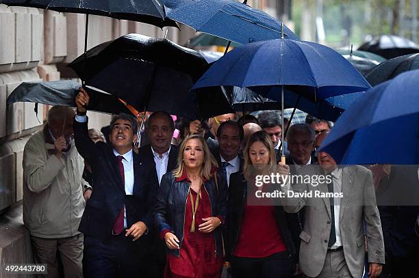 Catalonia's former Vice-President Joana Ortega surrounded by Catalonia Government members and representatives from pro-Independence associations'...