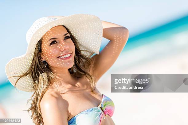 thoughtful woman in summer - sun hat stock pictures, royalty-free photos & images