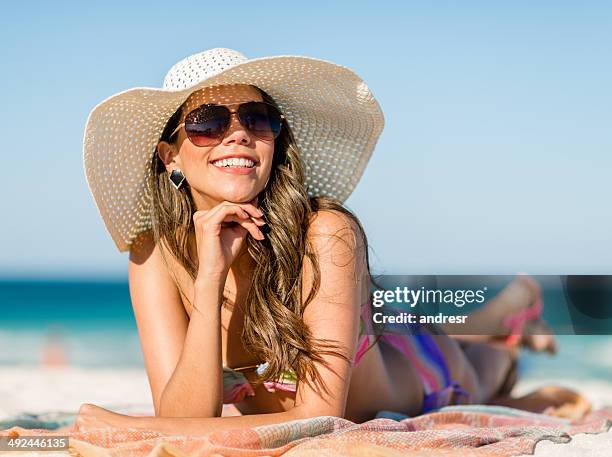 woman getting a tan in summer - sunny florida stock pictures, royalty-free photos & images