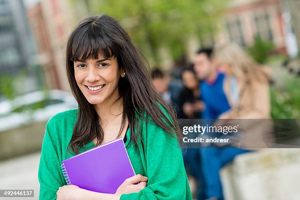 happy female student - exchanging books stock pictures, royalty-free photos & images