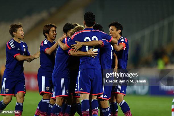 Japanese players in celebration after first goal during the international friendly match between Iran and Japan at Azadi Stadium on October 13, 2015...