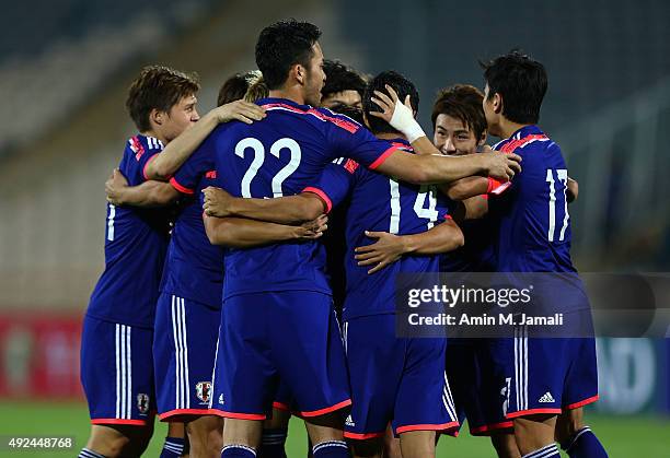 Japanese players in celebration after first goal during the international friendly match between Iran and Japan at Azadi Stadium on October 13, 2015...