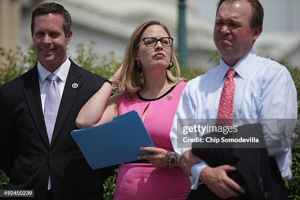 Rep. Rodney Davis , U.S. Rep. Kyrsten Sinema and U.S. Rep. Mick Mulvaney join a group of bipartisan Congressmen during a news conference outside the...