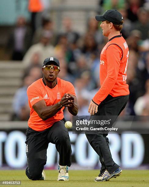 Michael Carberry of England drops Thisara Perera of Sri Lanka watched by Eoin Morgan during the NatWest International T20 match between England and...